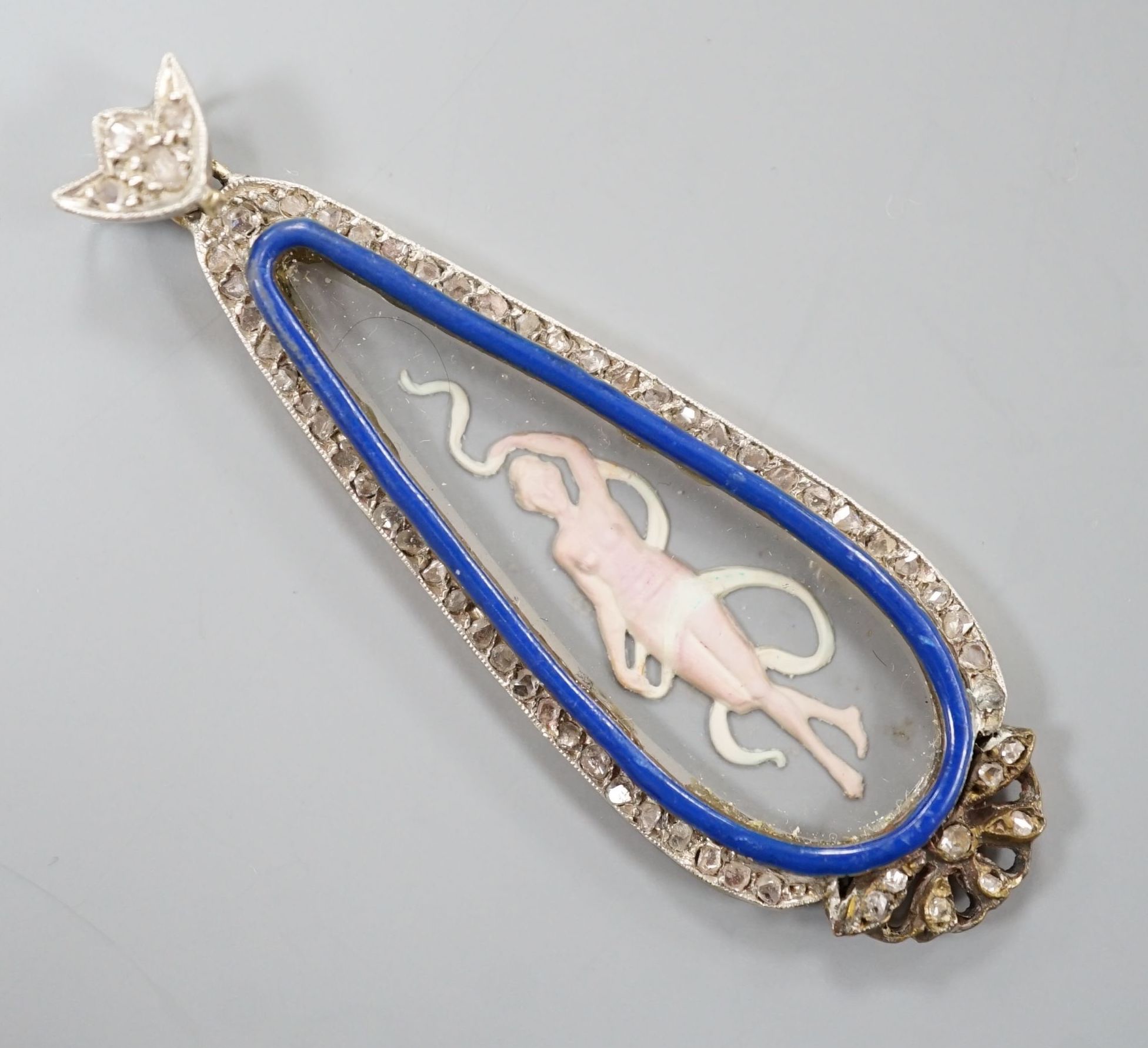 A Belle Epoque yellow and white metal, diamond and 'Essex crystal' style teardrop shaped pendant, decorated with a semi-clad maiden, 58mm, gross weight 6.3 grams.